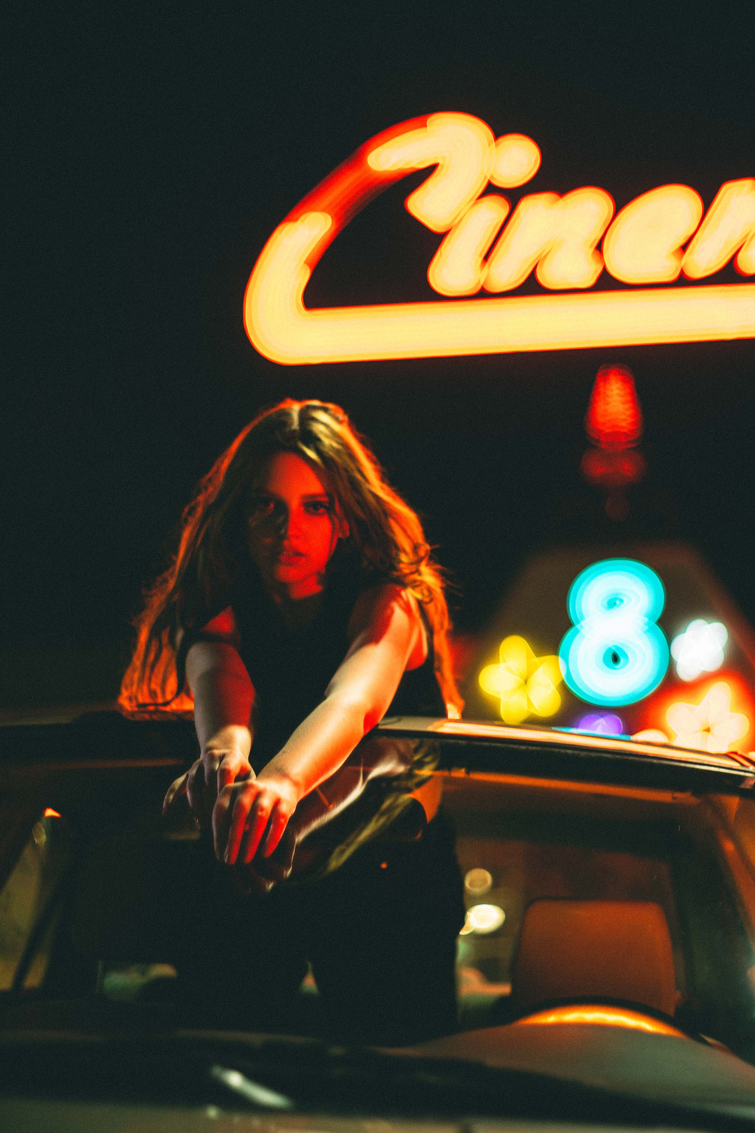 Cinematic Portraits with Vintage Flair by a Movie Theater — photograph 22 of 35
